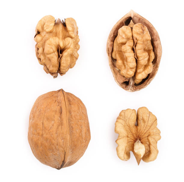 istock Walnuts isolated on white background. Top view. Flat lay. Set or collection 1127795887
