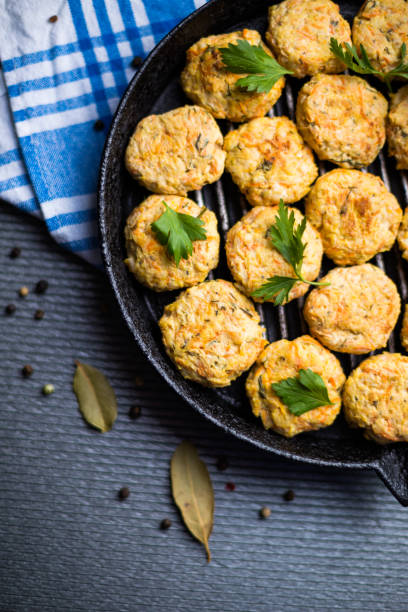 istock Meatballs roasted on pan grill over black table 1127796514