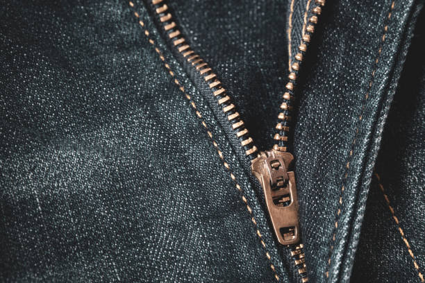 istock Close up of locking zipper on blue denim jeans 1127798407