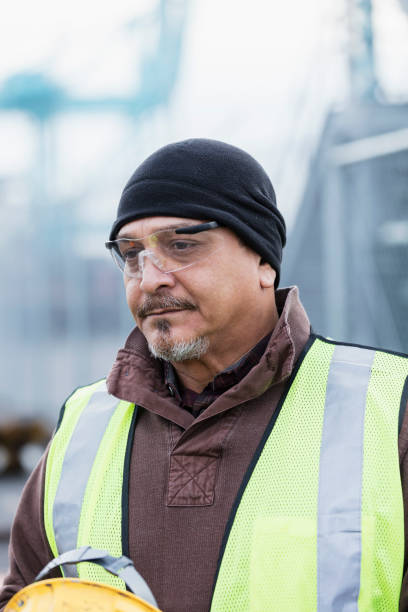istock Hispanic dock worker at shipping port 1127798683