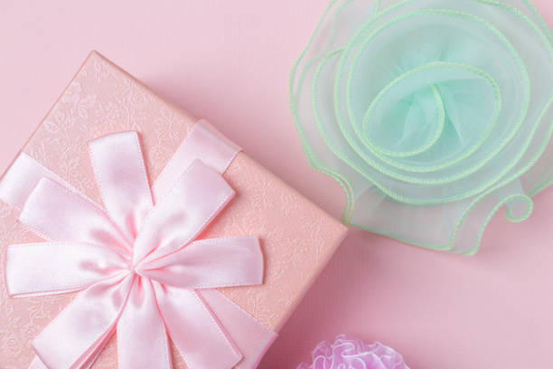 istock Pink  gift box and bows. Concept of romantic present 1127798774