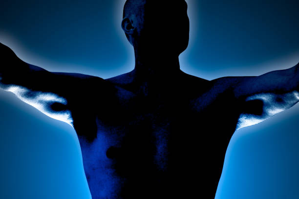 istock Silhouette of a man flexing his muscles and make a victory win pose. 1127798893