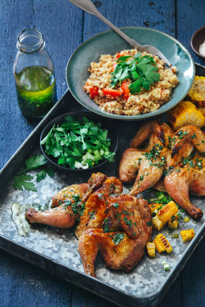 istock Grilled whole butterflied chickens 1127799404
