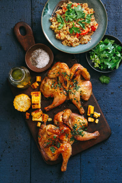 istock Grilled whole butterflied chickens 1127799480