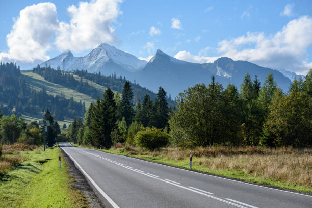 istock empty asphalt road outside city 1127800956