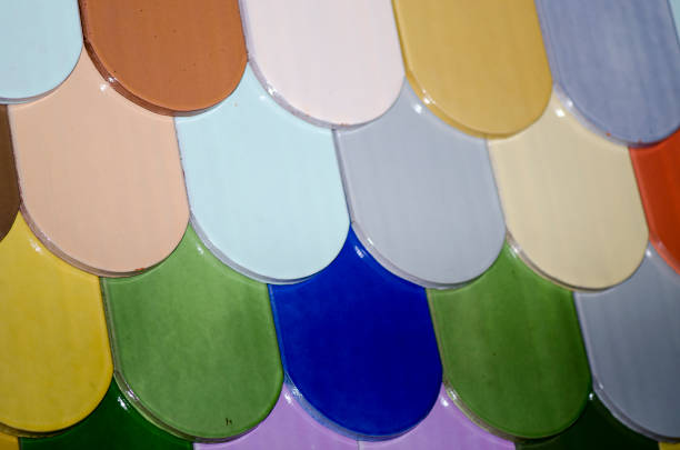 Detail of colorful roof tiles at display at a vendor's shop