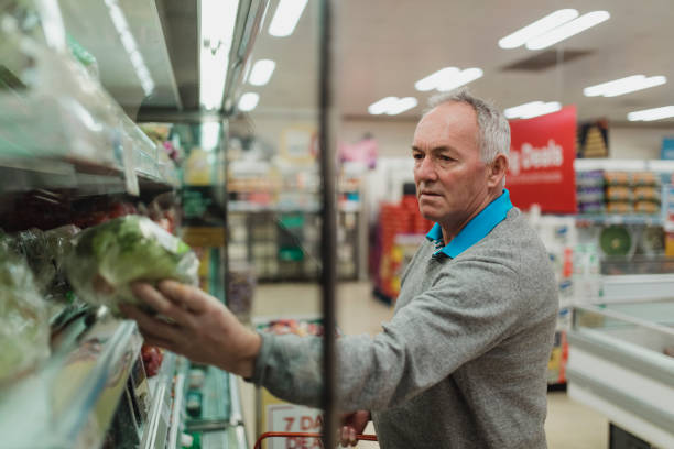 istock Senior Man in the Supermarket 1127804102