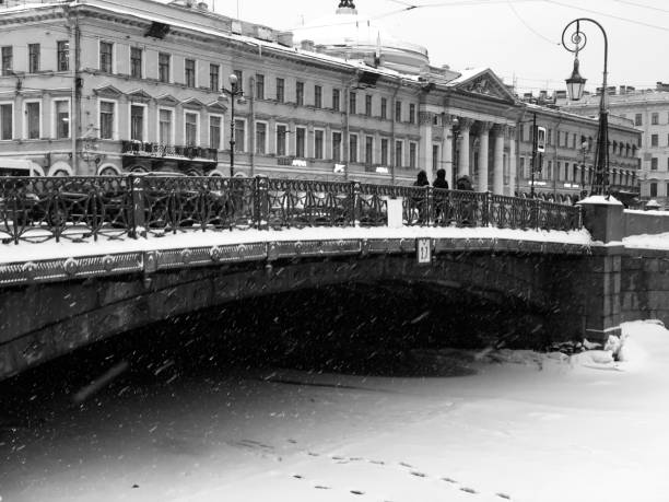 View of the Lion Bridge across the Griboyedov Canal on a sunny winter day, St. Petersburg, Russia