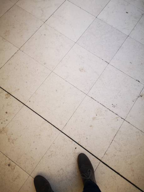 istock Marble floor with feet, selfie 1127805419