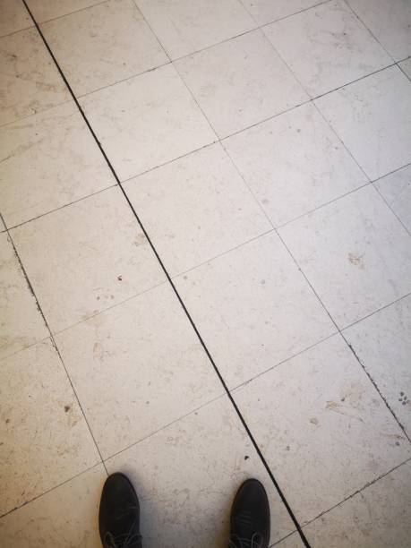 istock Marble floor with feet, selfie 1127805456