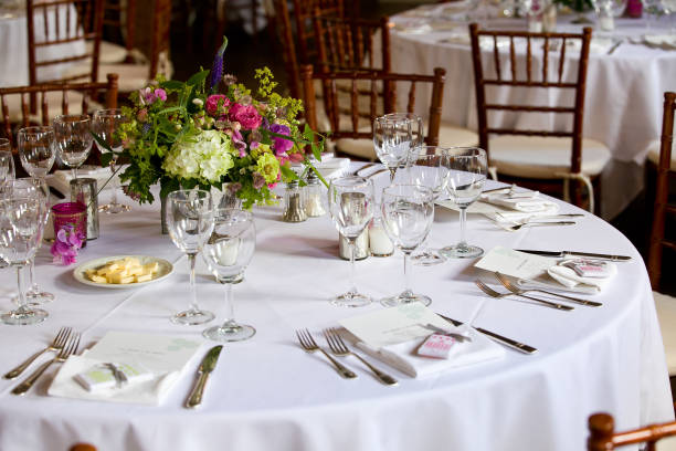 istock Wedding table decoration series - tables set for beautiful indoor catered luxury wedding event 1127805470