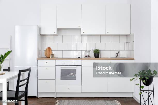 Contemporary Kitchen With Table Stock Photo - Download Image Now - Kitchen, White Color, Refrigerator