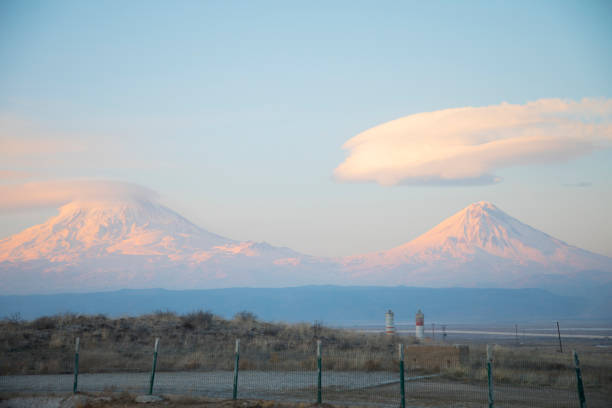 istock Mount Ararat (Greater Ararat), with snow on summit, on clear day with minimal clouds, and fields below, on the border between Turkey and Armenia, viewed from eastern Turkey 1127808127