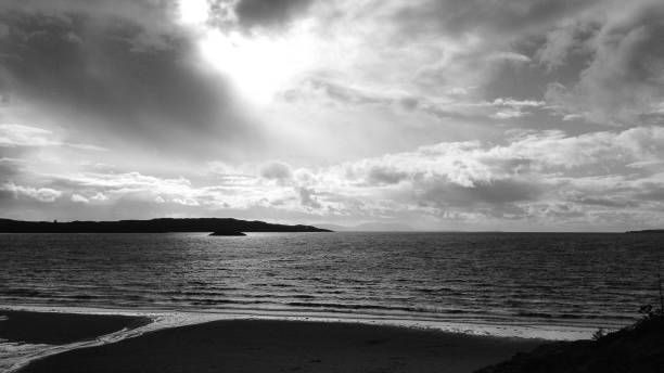 istock beautiful view over a Scottish lake in the sunset with cloudy sky 1127810347