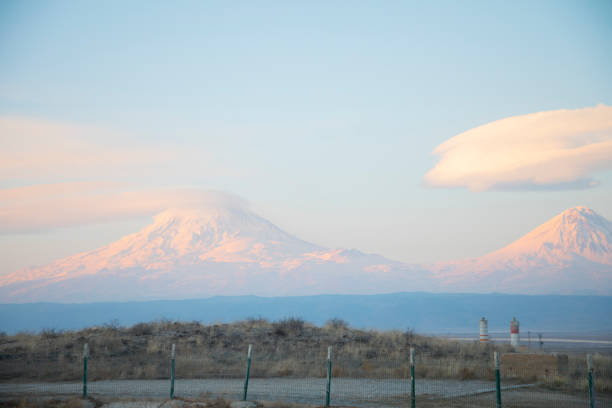 istock Mount Ararat (Greater Ararat), with snow on summit, on clear day with minimal clouds, and fields below, on the border between Turkey and Armenia, viewed from eastern Turkey 1127810705