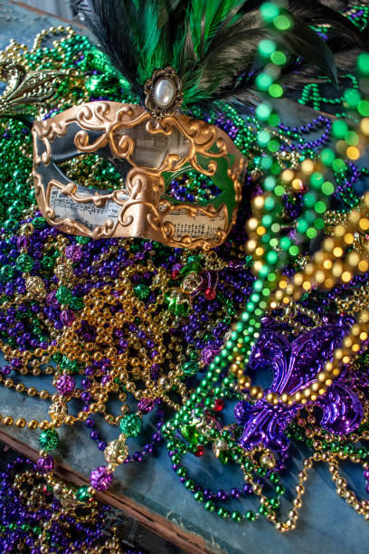 istock mardi gras mask and beads 1127812015
