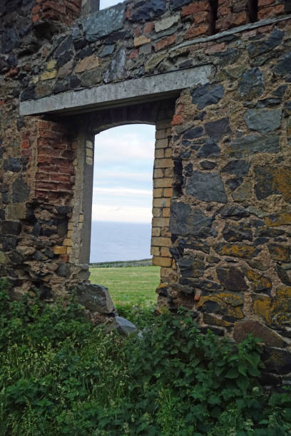 istock ruin at the Torr Head 1127812479