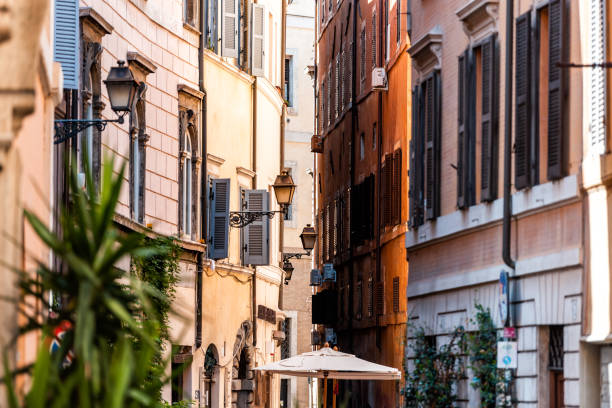 italian outside traditional narrow empty alley with nobody on street in historic city summer plants lanterns - 11315 imagens e fotografias de stock