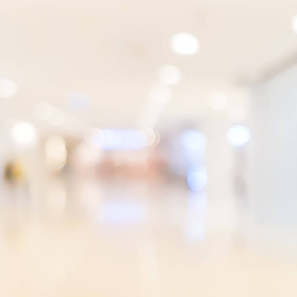 istock abstract blur inside modern architecture loft cozy interior condominium lobby as square background with lamp light bokeh effect for banner , ads design on display image concept 1127815523