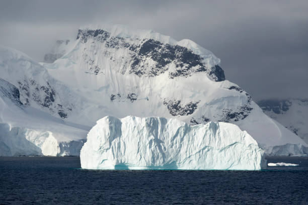 istock Anvers Island mountain glacier iceberg Gerlache Strait Antarctica 1127817089