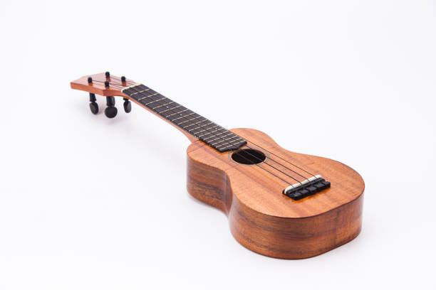 istock The ukulele guitar isolated on white background 1127824530