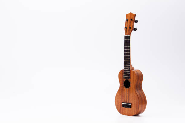 istock The ukulele guitar isolated on white background 1127824551