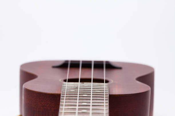 istock The ukulele guitar isolated on white background 1127824567