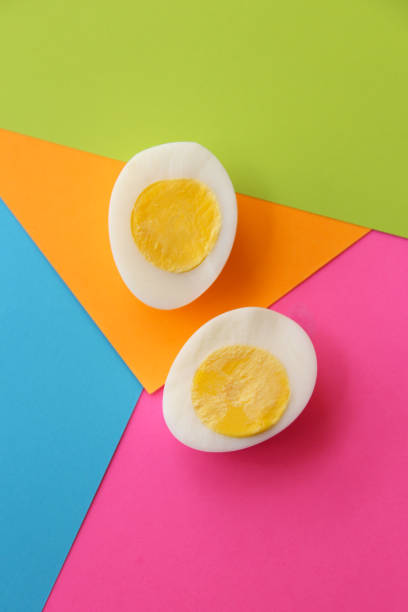 boiled cut egg on color paper