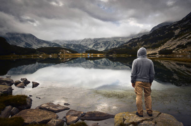 istock Traveling alone in the mountains at sunset 1127825803