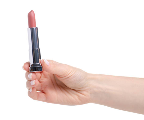 istock Lipstick in hand beauty 1127827063