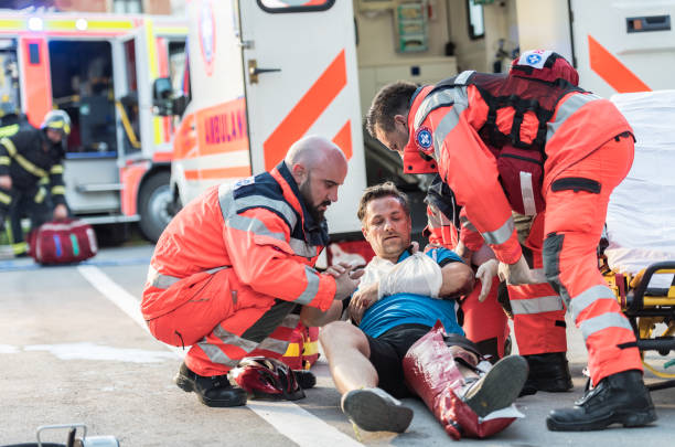istock Paramedic Team Helping Injured Cyclist 1127827899