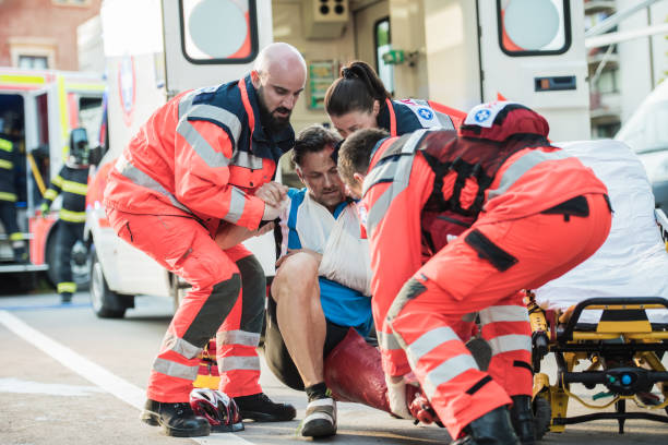 istock Paramedic Team Helping Injured Cyclist 1127827905