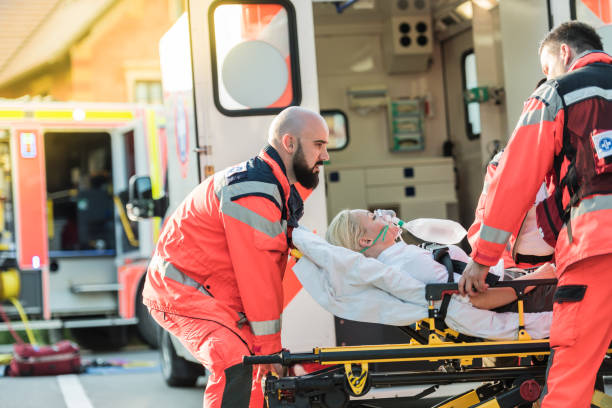 istock Paramedic Team Helping Injured Woman 1127827906