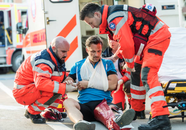 istock Paramedic Team Helping Injured Cyclist 1127827931