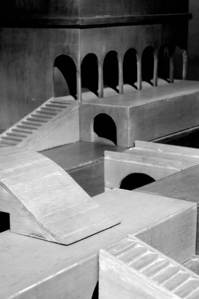 istock WOODEN MODEL WITH BLACK AND WHITE STAIRS AND ARCADES 1127829448