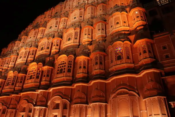 Hawa Mahal, pink palace of winds in old city Jaipur, Rajasthan, India. Background of indian architecture, close up