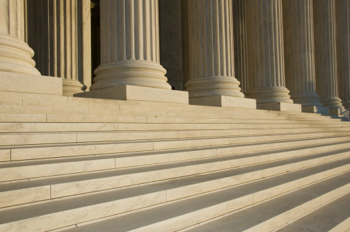 Stairs and columns in front of the United States Supreme Court in Washington DC.