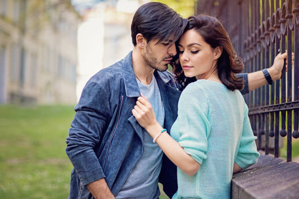 istock Happy, young couple is hugging and kissing 1127833600