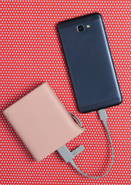 istock Power bank charged modern smartphone 1127834845