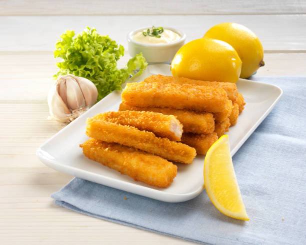 istock Fish Fingers with Salad and sauces 1127835429
