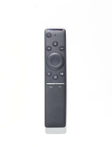 istock Modern tv remote on a white background. Photo with shadows, hard light, top view 1127836273