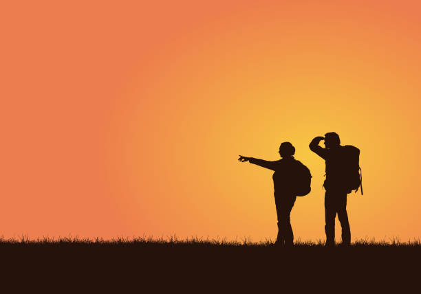Realistic illustration of a silhouette of a pair of tourists with backpacks, men and women on a walk. A woman shows her hand, a man looks. Isolated on an orange background - vector Realistic illustration of a silhouette of a pair of tourists with backpacks, men and women on a walk. A woman shows her hand, a man looks. Isolated on an orange background - vector journey silhouettes stock illustrations