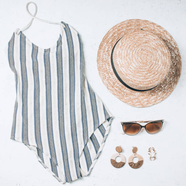 istock woman swimsuit beach accessories collage on white background, 1127836696