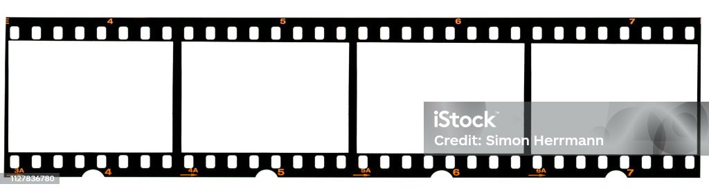 real 35mm film strip on white, analogue photo frame placeholder real 35mm film material Camera Film Stock Photo