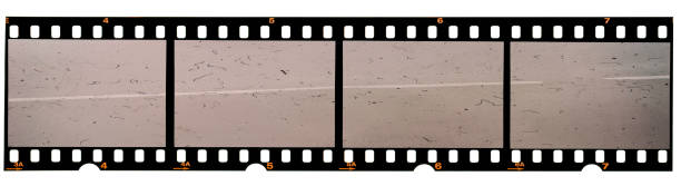 real 35mm film strip on white, analogue photo frame placeholder real 35mm film material 35mm movie camera stock pictures, royalty-free photos & images