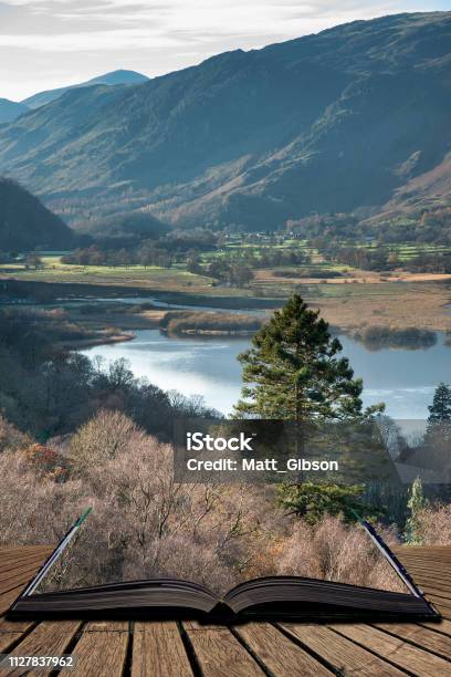 Stunning Autumn Fall Landscape Image Of View From Route To Walla Crag Near Derwent Water In Lake District Coming Out Of Pages Of Open Story Book Stock Photo - Download Image Now