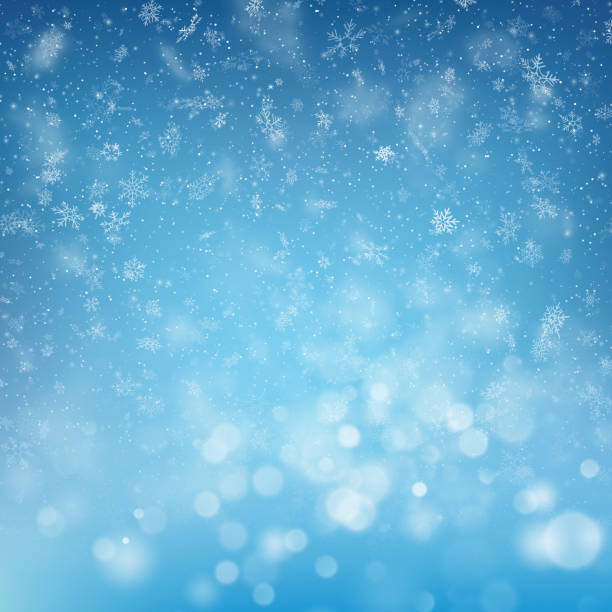 istock Blurred bokeh light snowflakes on blue background. Christmas and New Year holidays template. Abstract glitter defocused blinking stars and sparks. EPS 10 1127838121