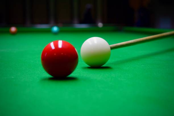 Snooker game Snooker game with cue on the billard table and white and red balls ready to play billard queue stock pictures, royalty-free photos & images