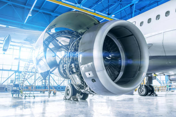 Industrial theme view. Repair and maintenance of aircraft engine on the wing of the aircraft. Industrial theme view. Repair and maintenance of aircraft engine on the wing of the aircraft turbine stock pictures, royalty-free photos & images