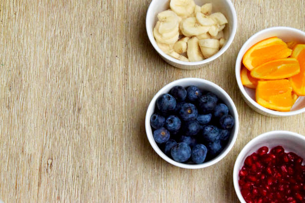 Healthy fresh fruit in bowls